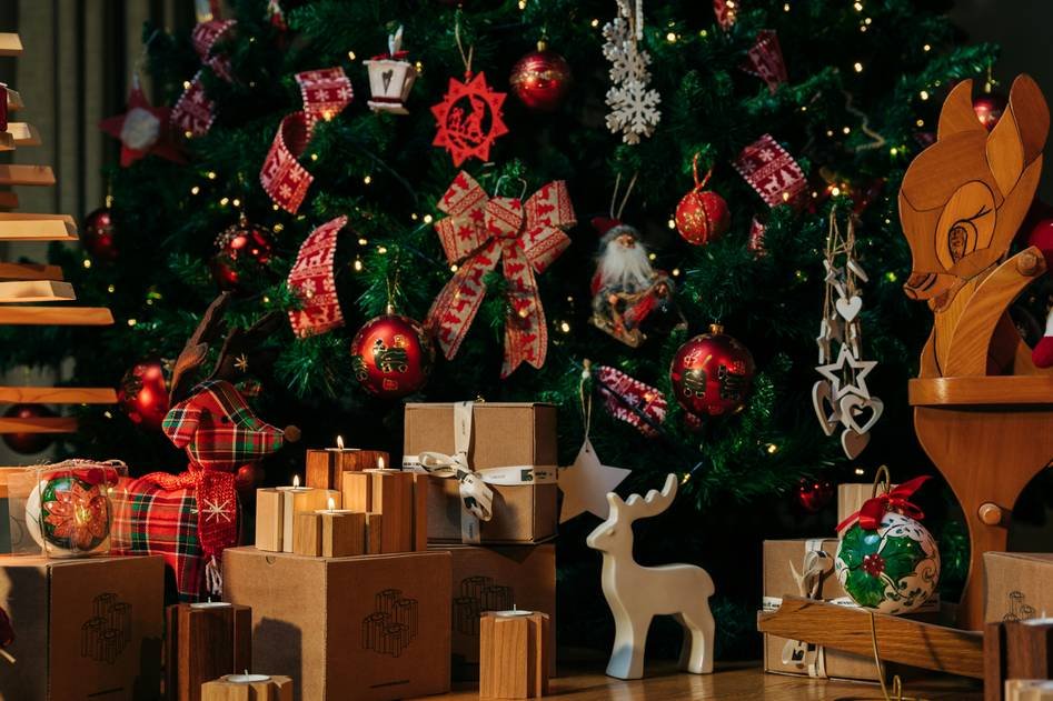 Close-up of sparkling Christmas lights and velvet ribbons
